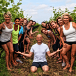 Practicing yoga in the vineyard at Southbrook Vineyards with Igita Yoga instructor Tim Rivers.