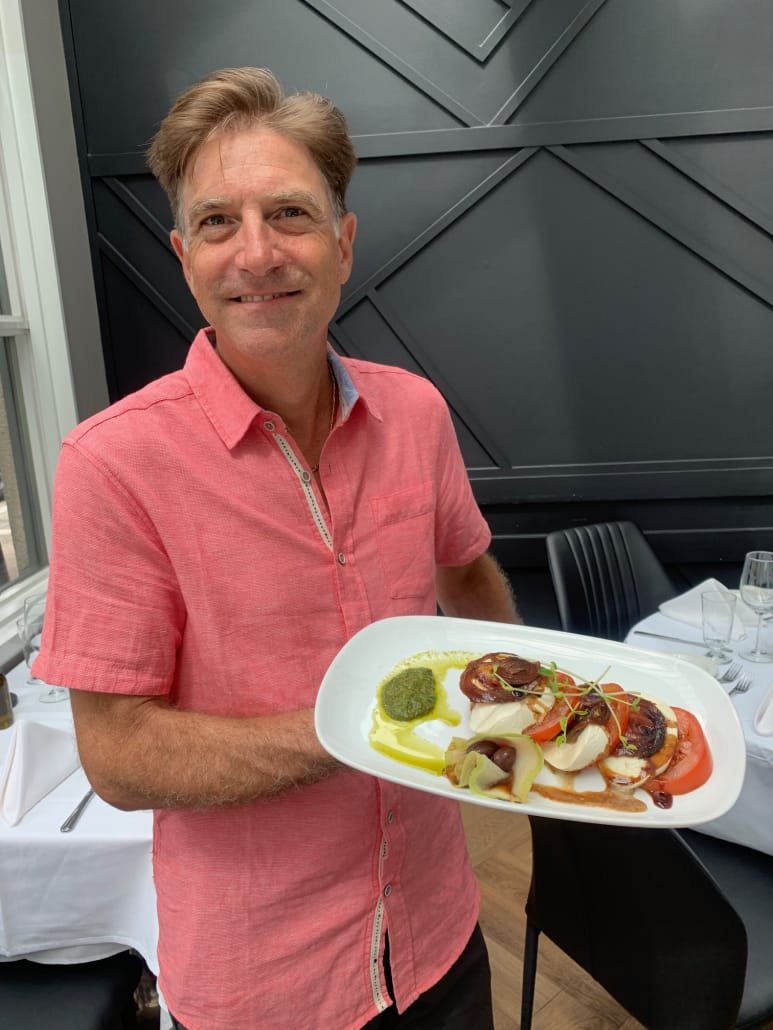Michael Morra Jr. showcases the delicious Salada Caprese at Michael's Back Door

